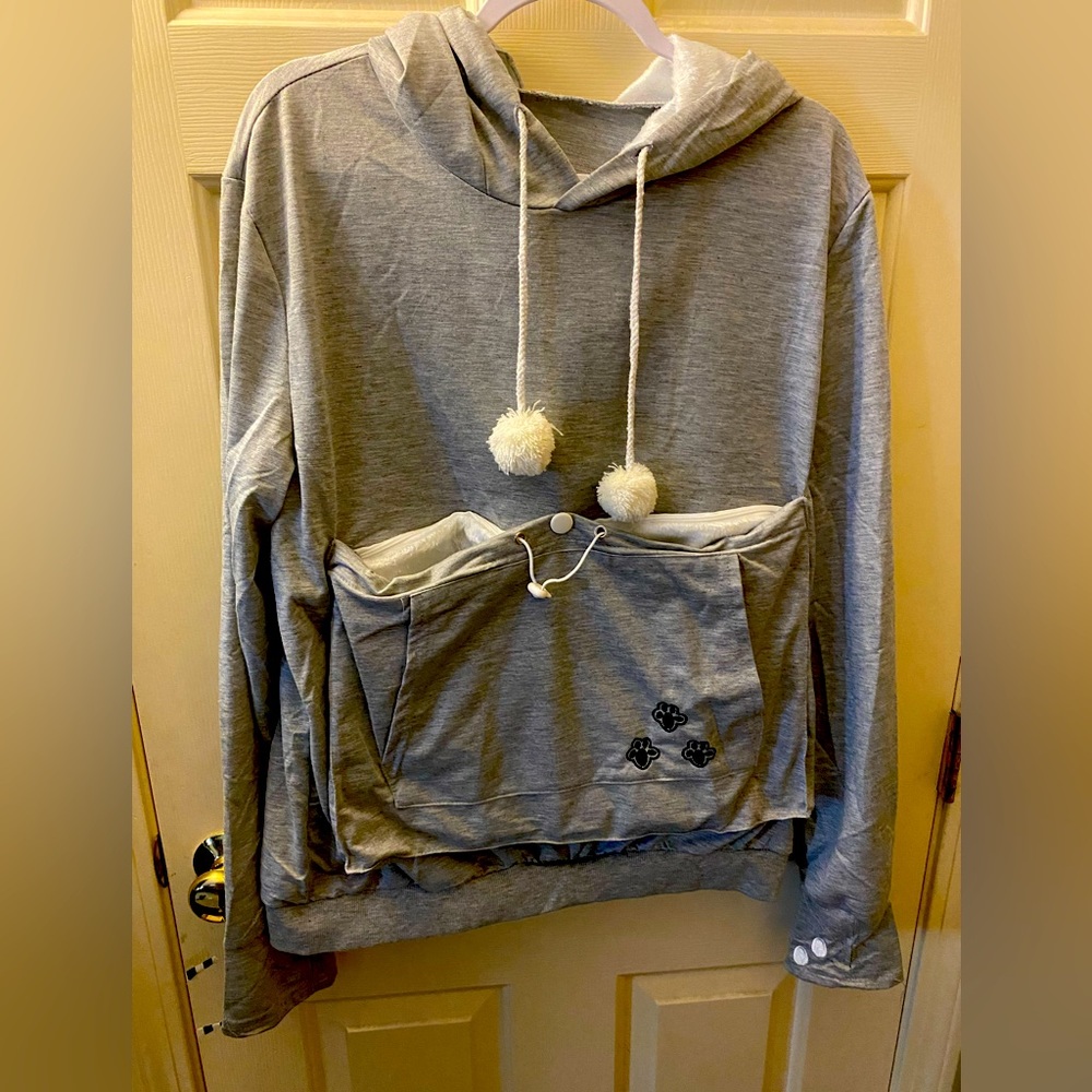 Carry your pet with you!no tags but never worn/pet goes in removable pocket